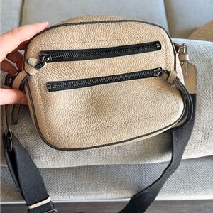 Beige Pebbled Crossbody Bag with Black Trim